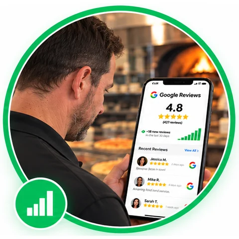 The owner checking his reviews dashboard on his phone